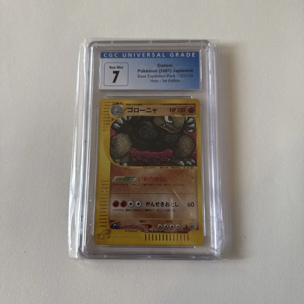 Golem 122/128 1st Ed Holo Pokemon eSeries Expedition (2001) Japanese - CGC 7